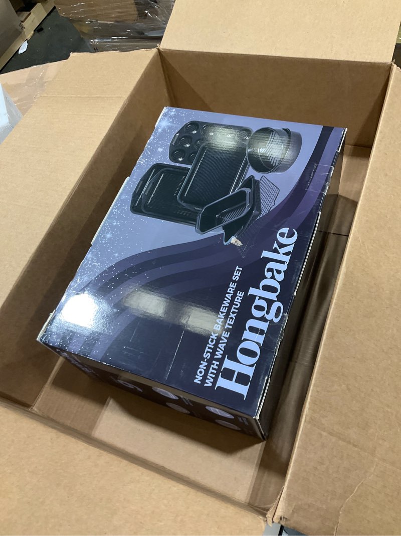 Condition photo showing item condition for HONGBAKE 9-Piece Baking Pans Set with Wave Texture for Reduced Oil, 0.8mm Thick Bakeware Sets Non Stick, Includes Stackable Cookie Sheets for Oven Cooking, Cake Pan, Muffin Pan, Loaf Pan, Rack, Gold Antique Gold