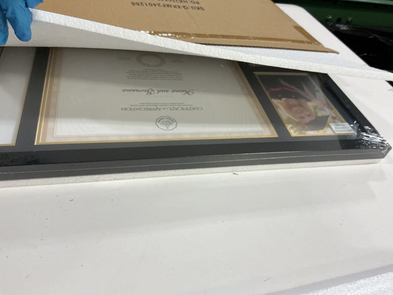 Condition photo showing New/Like New for GMFrames Class of 2025 2026 Diploma Frame with Tassel Holder for 8.5x11 Certificate and 5x7 Photo,Solid Wood,Tempered Glass,Black over Gold Mat Black 12x21 for 8.5x11, 5x7 & Tassel