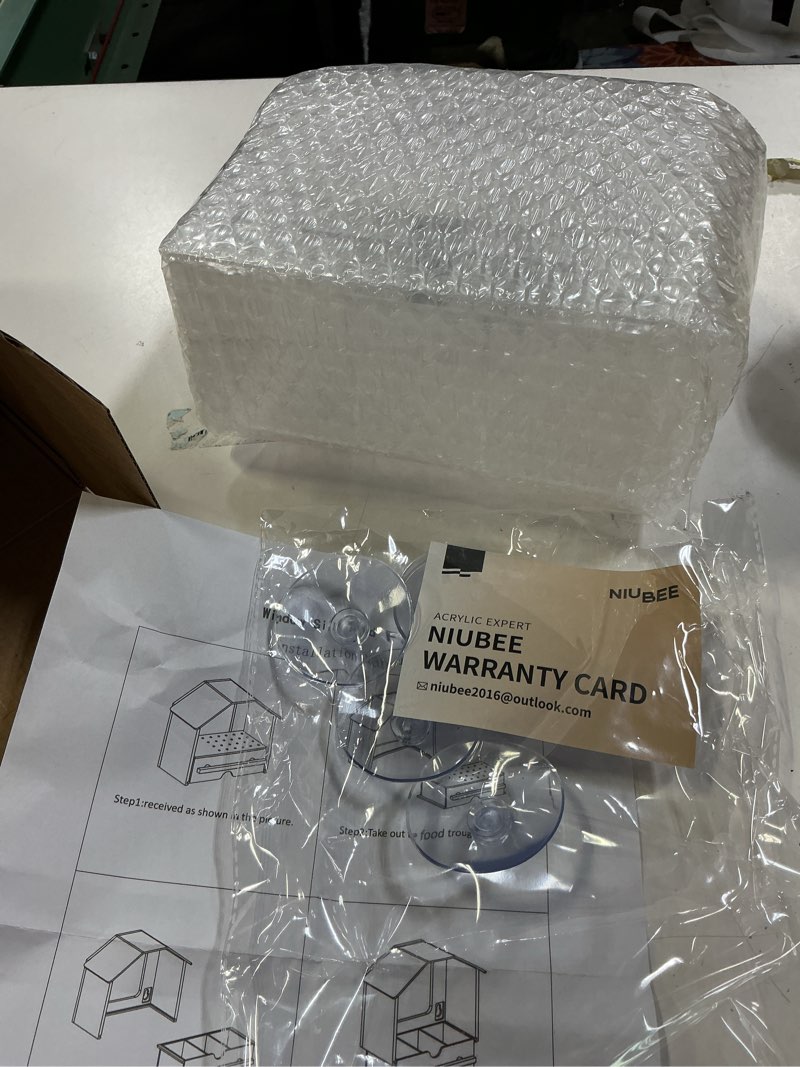 Condition photo showing Good Condition for niubee window bird feeder for outdoors, acrylic bird feeder with strong suction cups, slide-out tray for easy seed filling, clear removable seed tray with drain holes to keep nuts fresh & dry