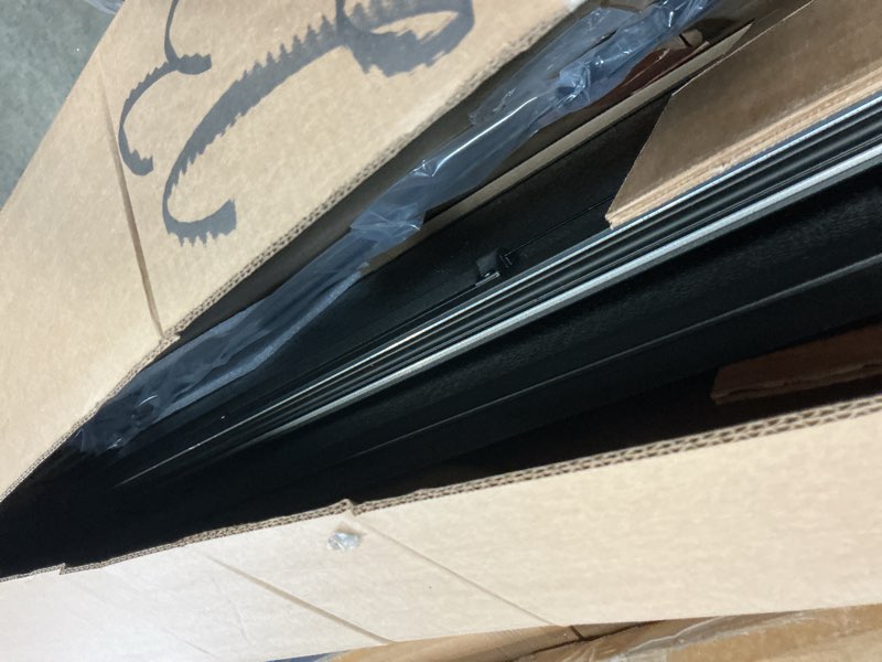 Condition photo showing As Is for gator efx hard tri-fold truck bed tonneau cover - heavy-duty truck bed protection - durable aluminum panels - hard folding tonneau cover - 2015-2020 ford f-150 (incl. raptor) - 5'7" bed hard tri-fold w/ cargo retriever 5' 7" bed