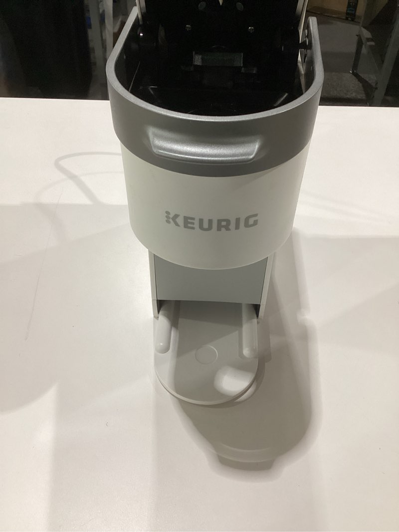 Condition photo showing As Is for Keurig K-Slim Single Serve K-Cup Pod Coffee Maker, Multistream Technology, 3 Brew Sizes, Slim and Sleek Design, 46oz Removable Reservoir, White, NOT TESTED, AS IS,  MISSING PART