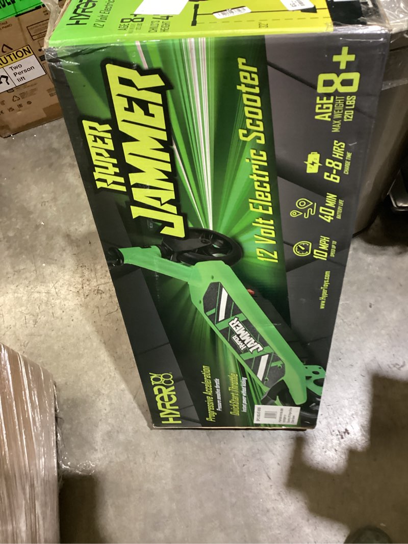 Condition photo showing As Is for hyper jammer kids electric scooter 12 volt battery powered scooter - green
