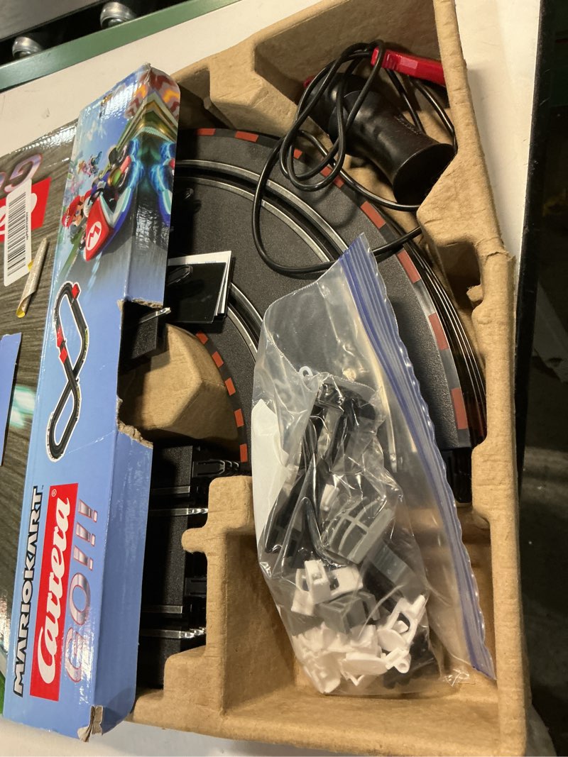 Condition photo showing As Is for Carrera GO Battery Operated 1:43 Scale Slot Car Racing Toy Track Set with Jump Ramp for Kids Ages 5 Years and Up, Mario Kart