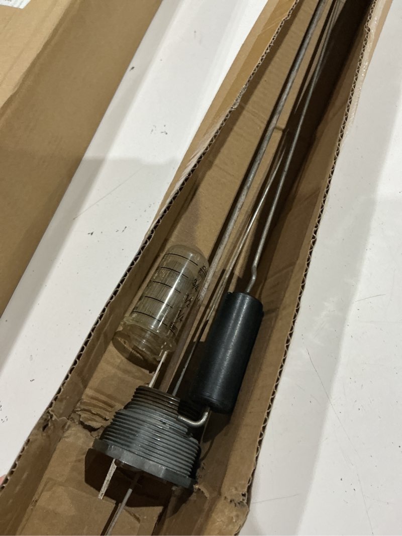 Condition photo showing As Is for oil tank gauge for 275 & 330 gallon vertical, float level measure, 1-1/2" and 2" male npt thread,designed for heating home oil tanks with depth of 42" to 44" with clear dial