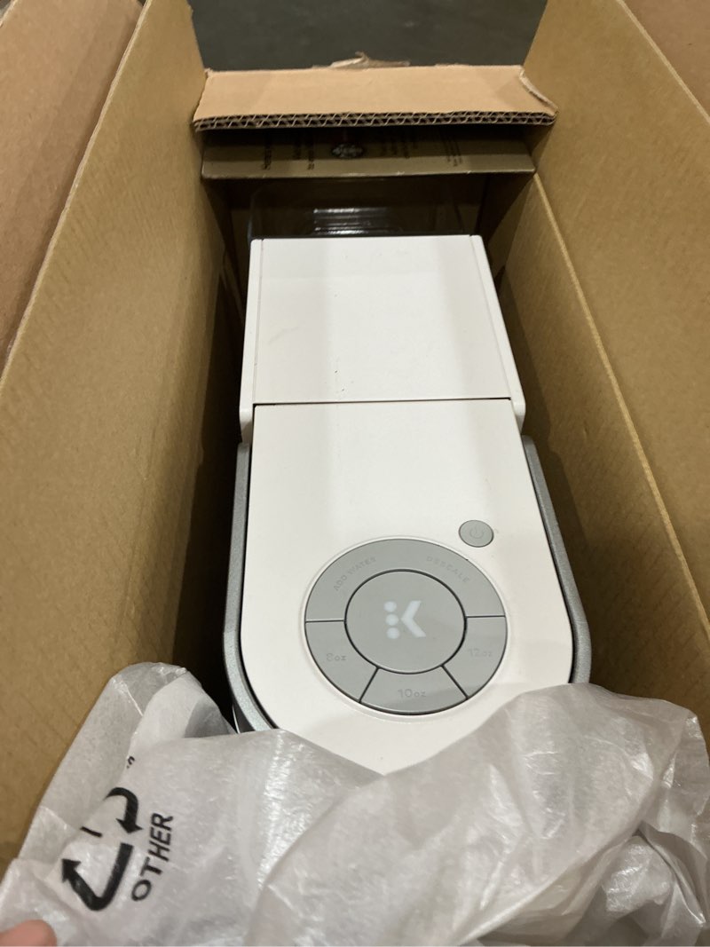 Condition photo showing As Is for keurig k-slim single serve k-cup pod coffee maker, multistream technology, 3 brew sizes, slim and sleek design, 46oz removable reservoir, white