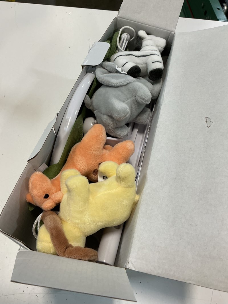 Condition photo showing Good Condition for the peanutshell crib mobile for boys or girls - white musical baby crib mobile with 12 lullabies, jungle animal, baby safari animals nursery decor