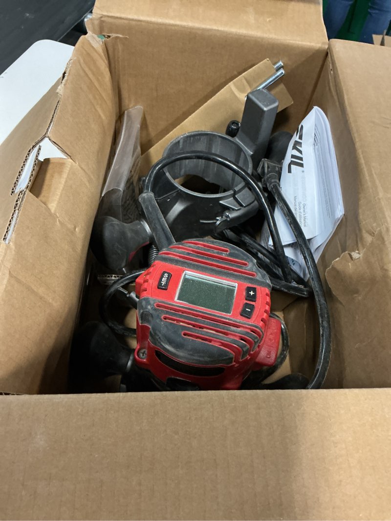 Condition photo showing As Is for skil 1/4-in and 1/2-in 14-amp 2.5-hp variable combo fixed/plunge corded router