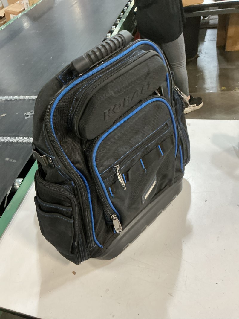Condition photo showing As Is for kobalt black/blue polyester 7-in w x 18.5-in d x 15-in l zippered backpack