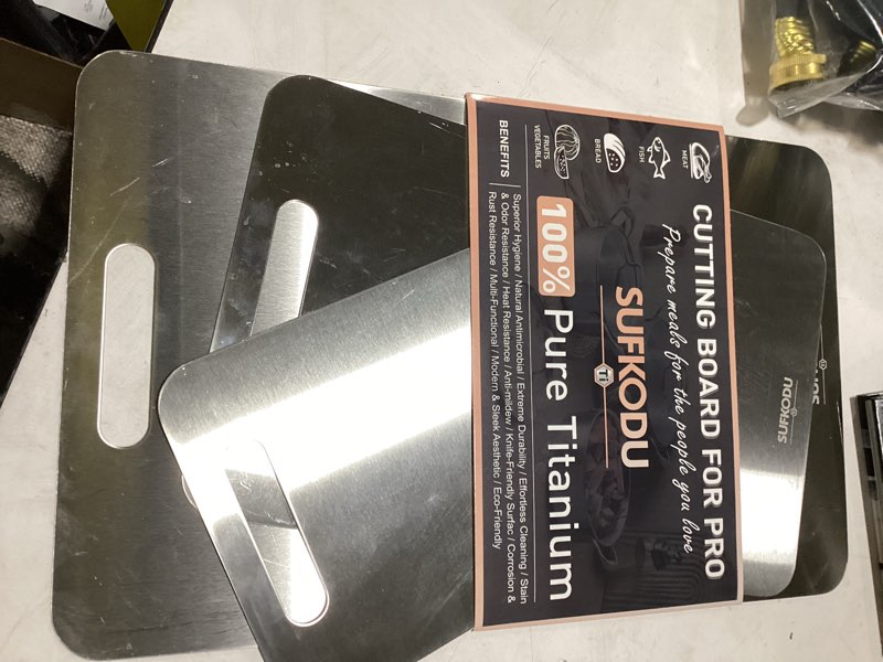Condition photo showing New/Like New for titanium cutting board set of 3, 100% double-sided titanium cutting boards for kitchen, dishwasher safe non-toxic chopping boards for meat, vegetables, fruits, raw and cooked food prep (m+l+xl?