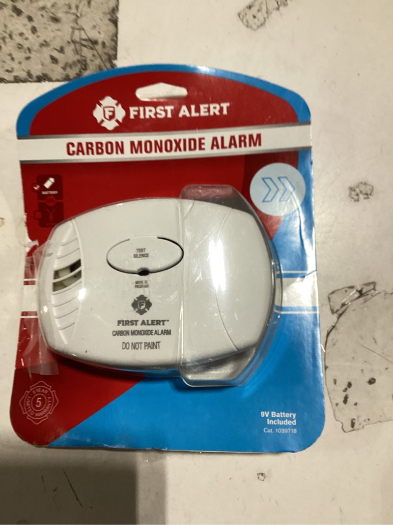 Condition photo showing As Is for basic co alarm w/ 9v battery