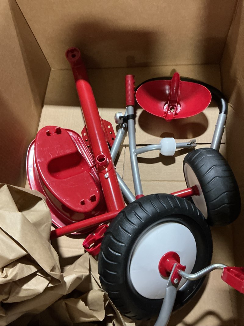 Condition photo showing Good Condition for radio flyer deluxe steer & stroll trike, red, for kids 2-5, 2-in-1 parent steer tricycle, removable push handle, adjustable seat, steel frame, covered storage bin, tricycle for toddlers and kids