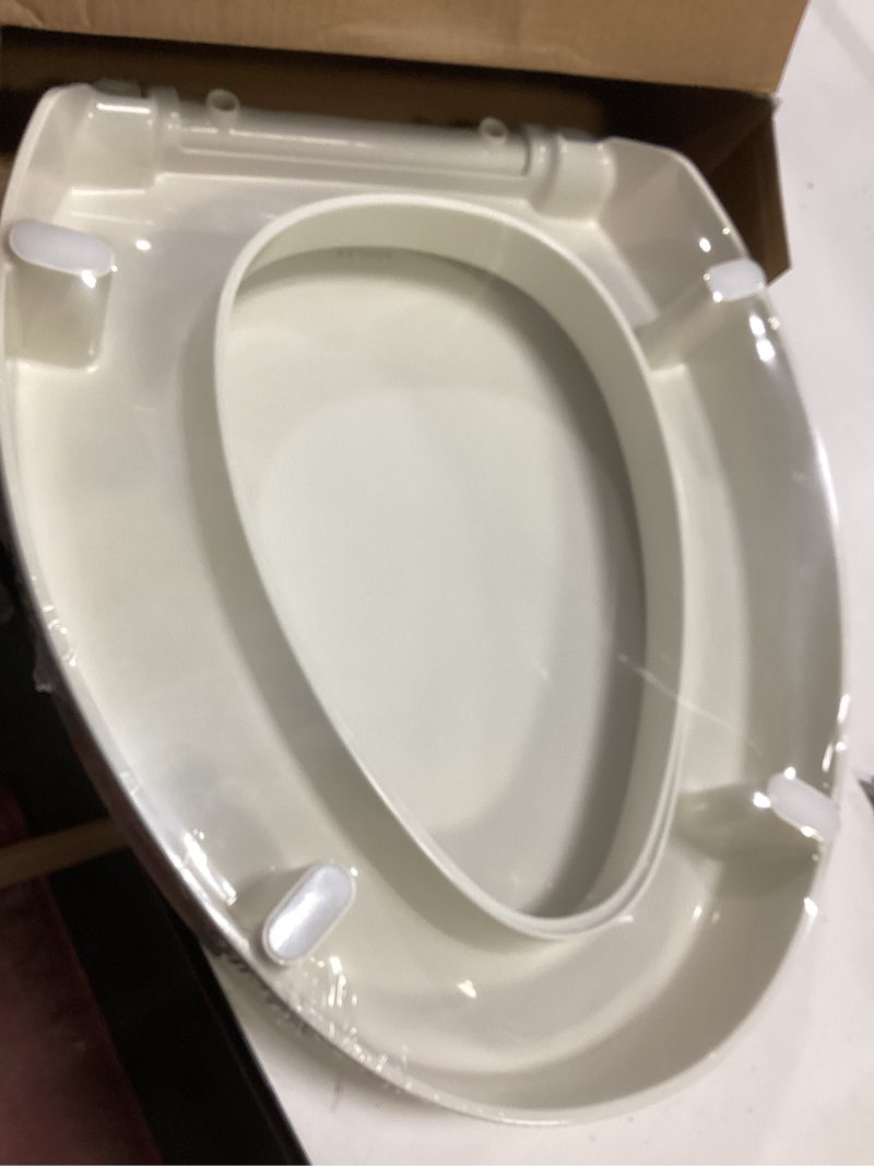 Condition photo showing New/Like New for KOHLER 25875-96 Hyten 3" Height, Elevated Soft Close Elongated Toilet Seat, Contoured Seat with Grip-Tight Bumpers, Quick-Attach Hardware, No Slam Toilet Seat, Biscuit Biscuit Elongated