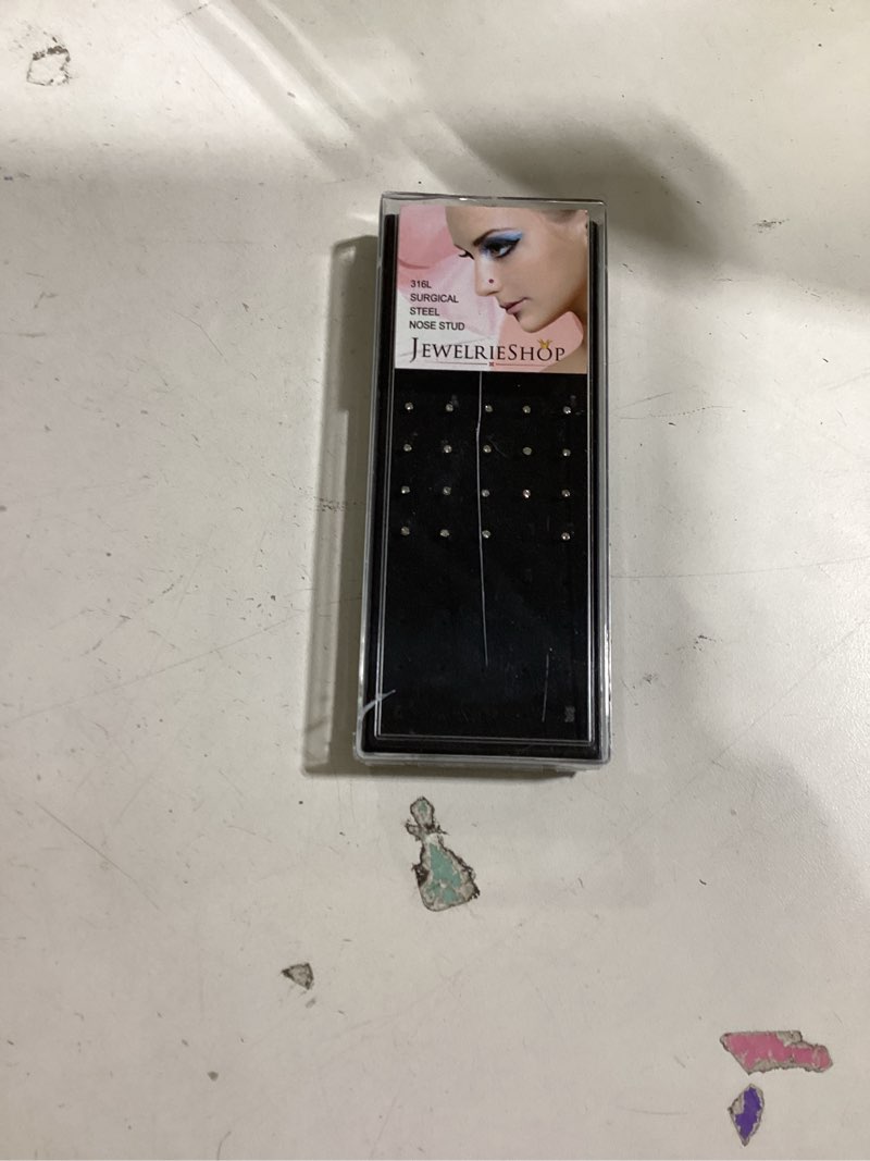 Condition photo showing As Is for Incomplete Thunaraz 60pcs Stainless Steel Nose Studs Rings Piercing Pin Body Jewelry 22G 1.5mm 2mm 2.5mm White