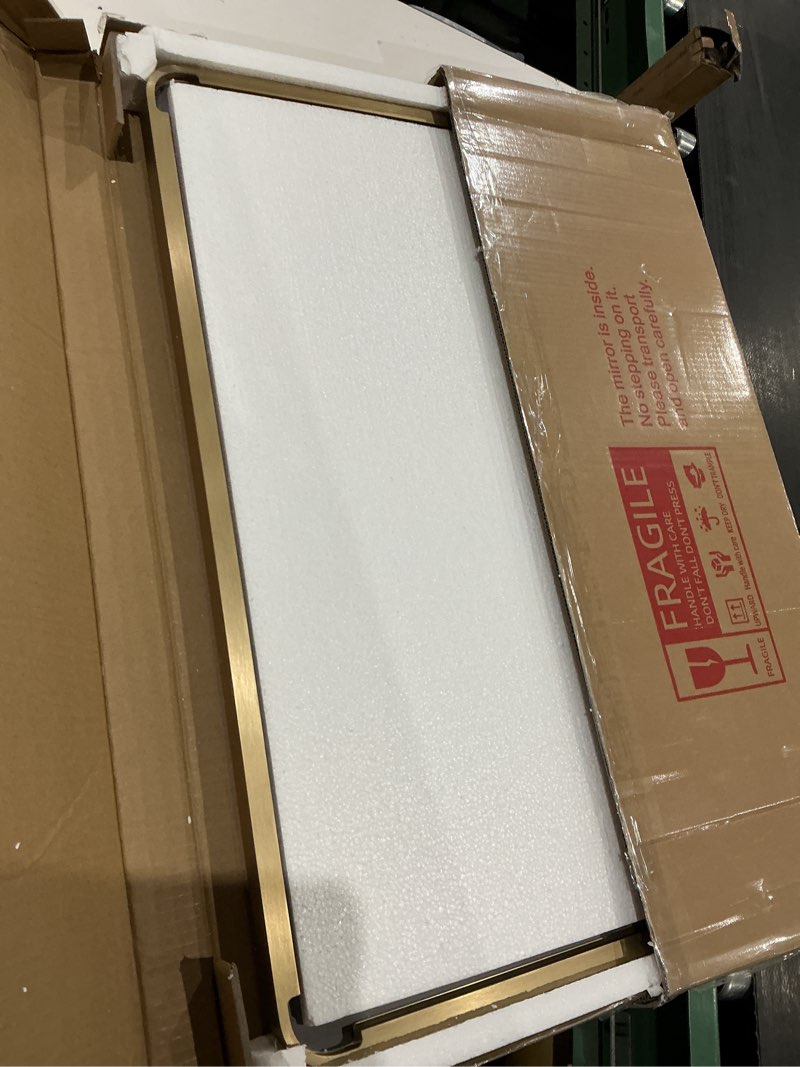 Condition photo showing Good Condition for gold bathroom mirror, 22x30 inch brushed gold metal frame mirror for wall, rounded rectangle bathroom vanity mirror, tempered glass, anti-rust, horizontal/vertical gold 22"l x 30"w