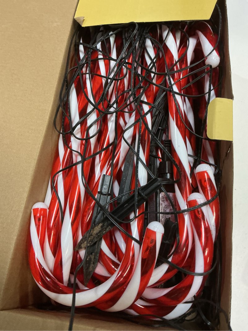 Condition photo showing As Is for 24 Pack Christmas Candy Cane Lights, Christmas Decorations Outdoor Waterproof with 8 Lighting Modes & Memory Function, Plug in Pathway Light for Outside Path Walkway Party Garden Yard Patio Xmas Decor 24 Pack (Plug in)