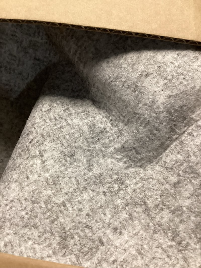 Condition photo showing As Is for gray rug