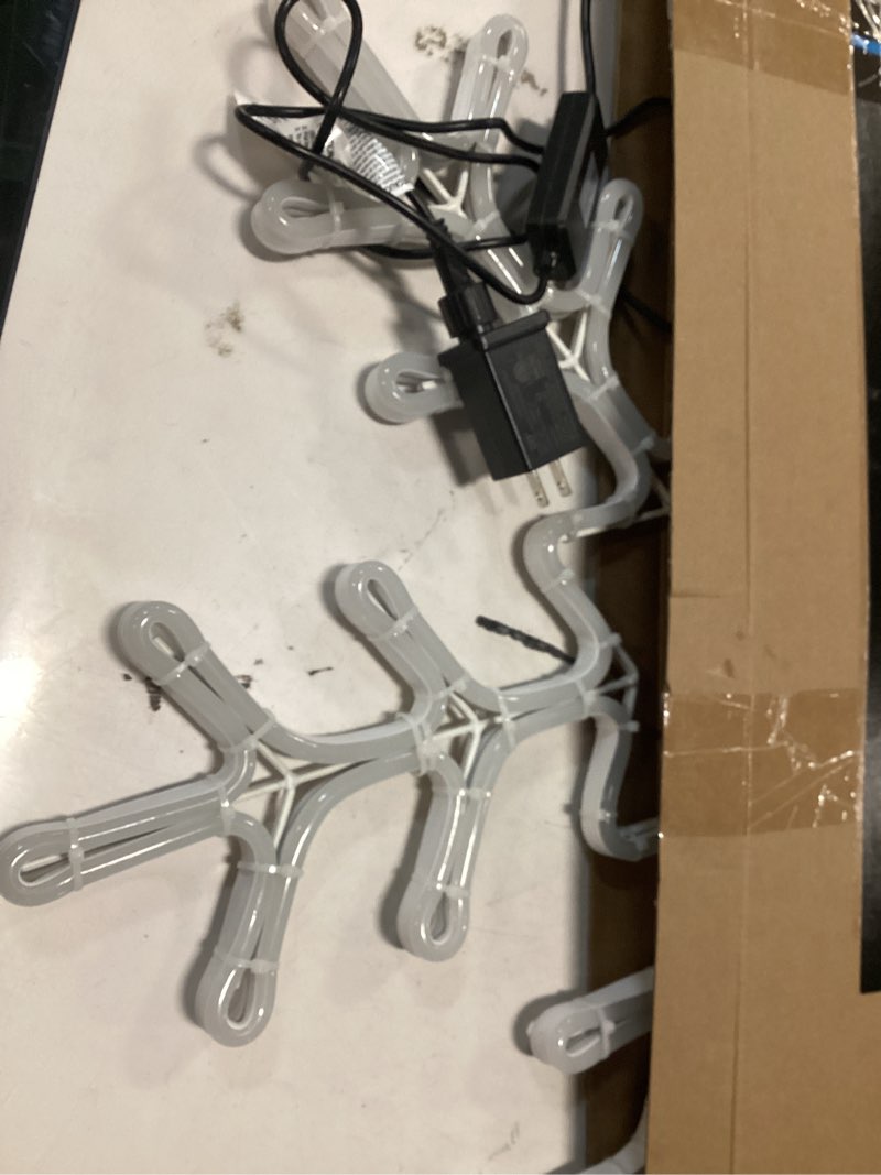 Condition photo showing As Is for 1k+ bought last week GE 28-in Hanging Snowflake Ornament with Multicolor LED Lights