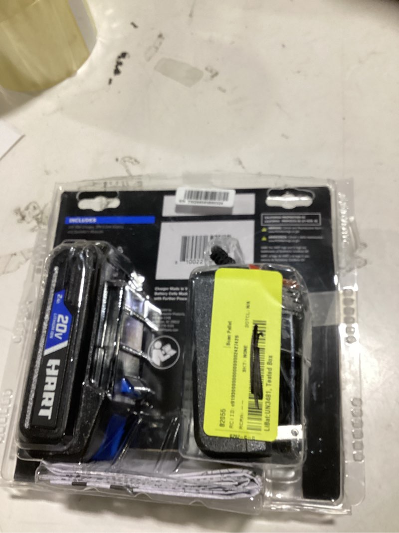 Condition photo showing As Is for hart 20-volt lithium-ion 2.0ah battery and 2amp fast charger