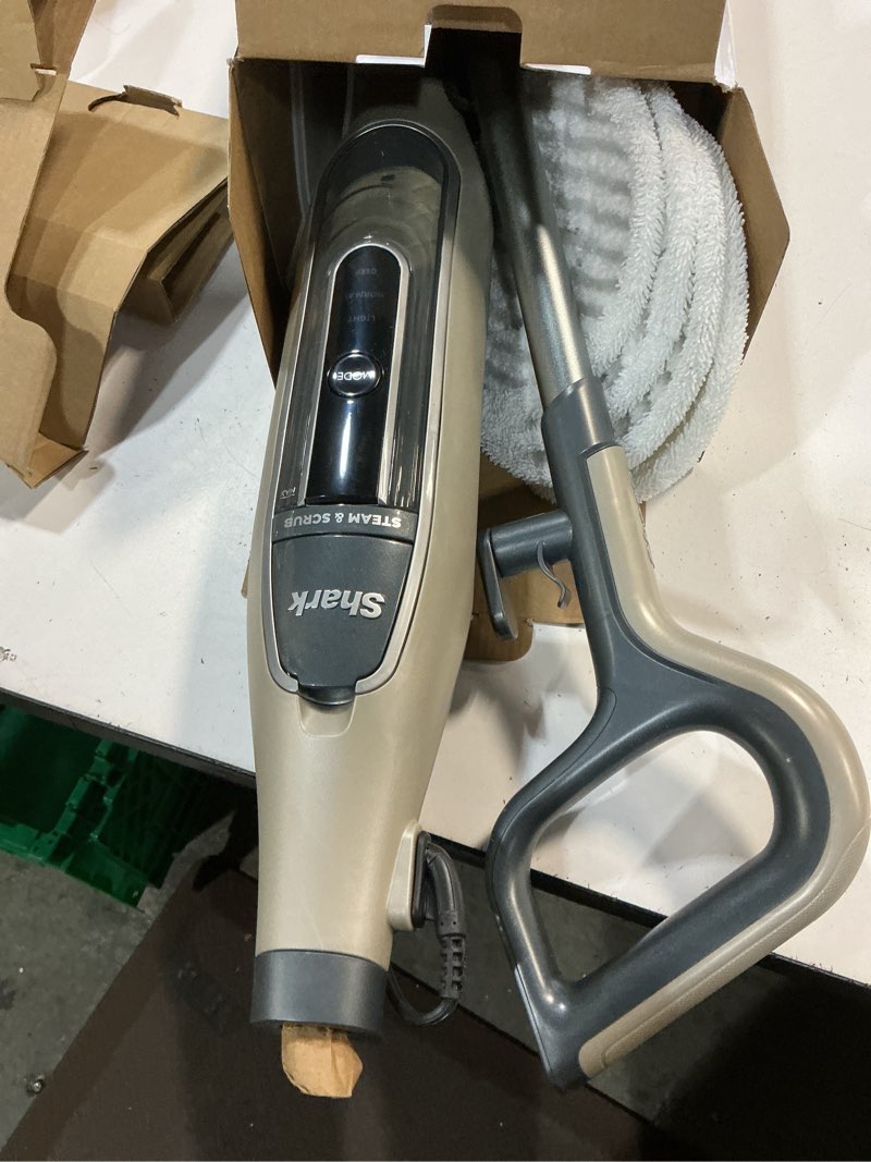 Condition photo showing Good Condition for shark s7001 mop, scrub & sanitize at the same time, designed for hard floors, with 4 dirt grip soft scrub washable pads, 3 steam modes & led headlights, gold steam & scrub