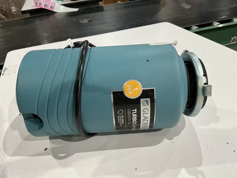 Condition photo showing As Is for turbogrind max 1 hp. continuous feed garbage disposal with power cord
