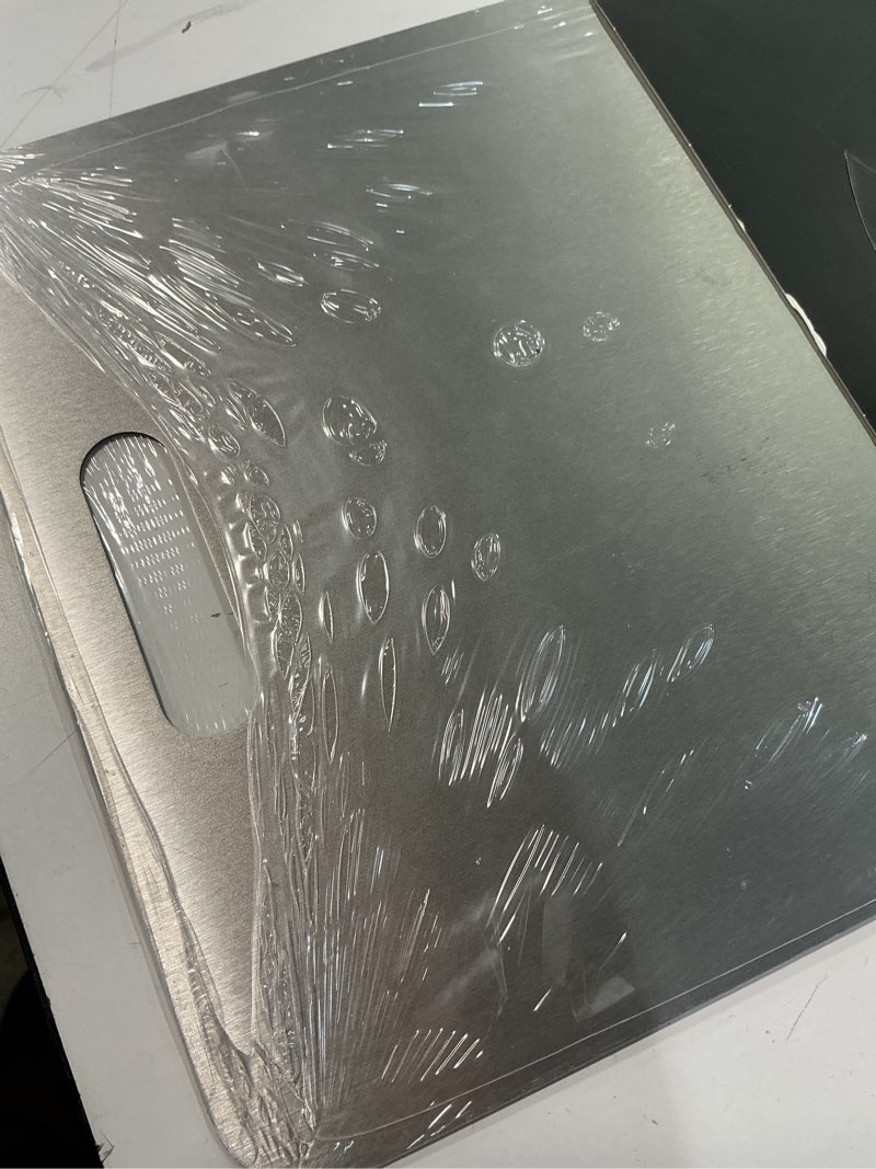 Condition photo showing item condition for Titanium Cutting Boards for Kitchen, 100% Pure Titanium Cutting Boards, Cutting Board Double Sided Food Grade, Perfect for Sushi, Meat, Vegetables & Meal Prep – Easy To Clean 18"x12"