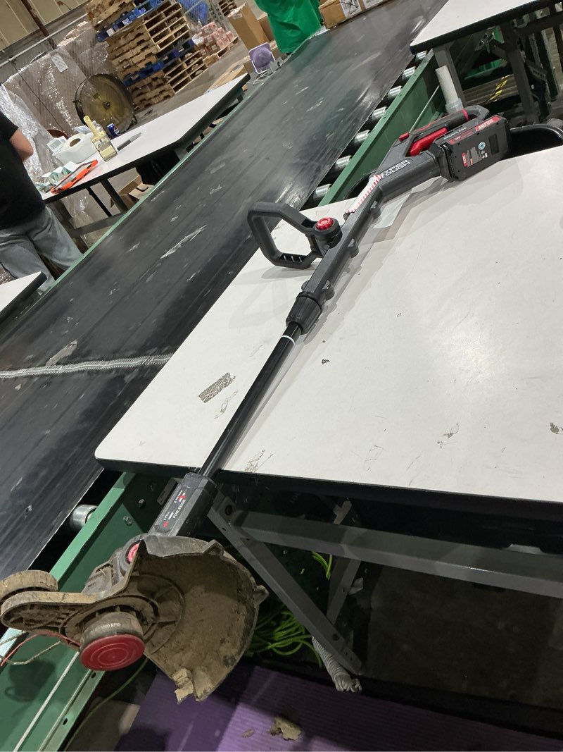Condition photo showing As Is for hyper tough (4.4) | 908 hyper tough 12\" 20v brushless cordless string trimmer with 20v max 2.0ah battery and charging cable