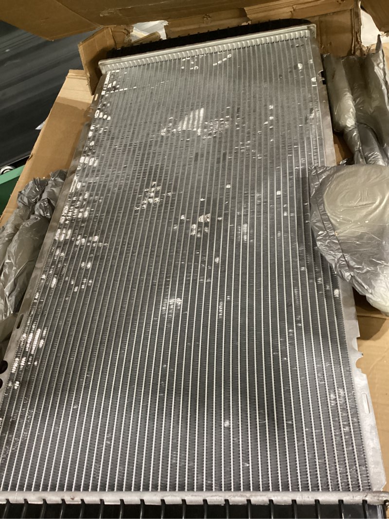 Condition photo showing As Is for *used* nilight radiator for gmc yukon 1994 1995 1996 1997 1998 1999 2000, chevy gmc suburban yukon tahoe pickup escalade c1500 c2500 c3500 k1500 k2500 k3500 5.0l 5.7l v8. chevy silverado 1995-1999
