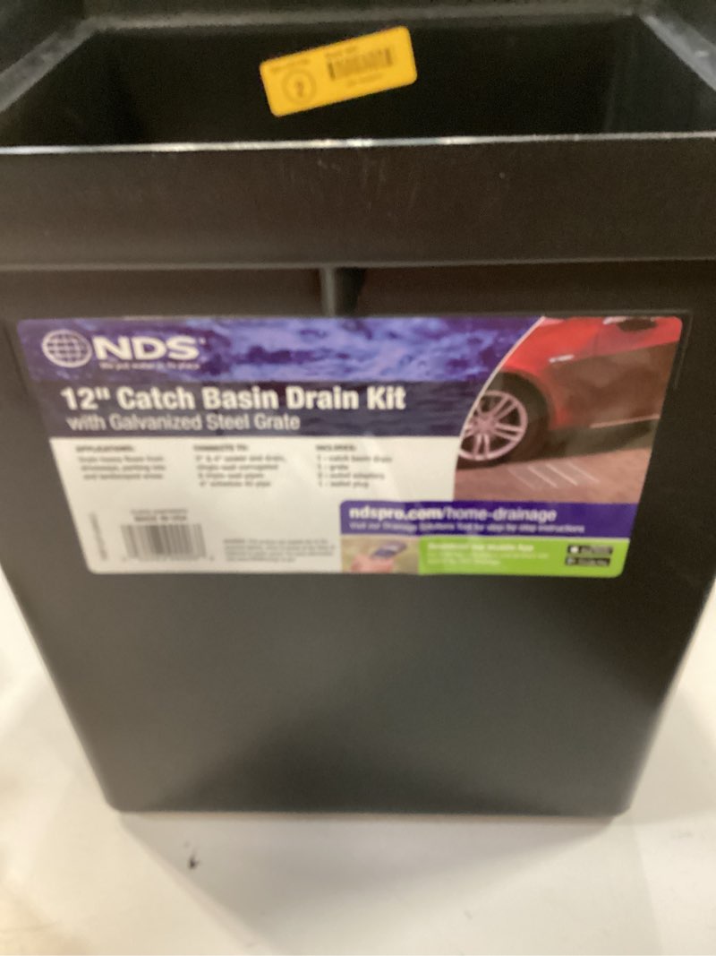 Condition photo showing Good Condition for 12 in. square catch basin drain kit with 2-opening catch basin steel grate 2-outlet adapters 1-outlet plug