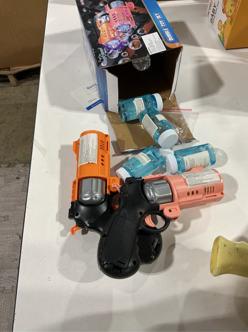 Condition photo showing Good Condition for eaglestone 2 pack revolver bubble guns for kids, swing-out cylinder, 8000+ bubbles/min, led light up, 4 bubble solution bottles, outdoor indoor toy, birthday easter gifts for toddlers orange?pink