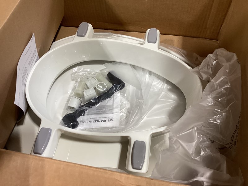 Condition photo showing Good Condition for bemis assurance 3" raised toilet seat for seniors, made in usa, secure hinges, clean shield guard, elongated, white elongated raised seat