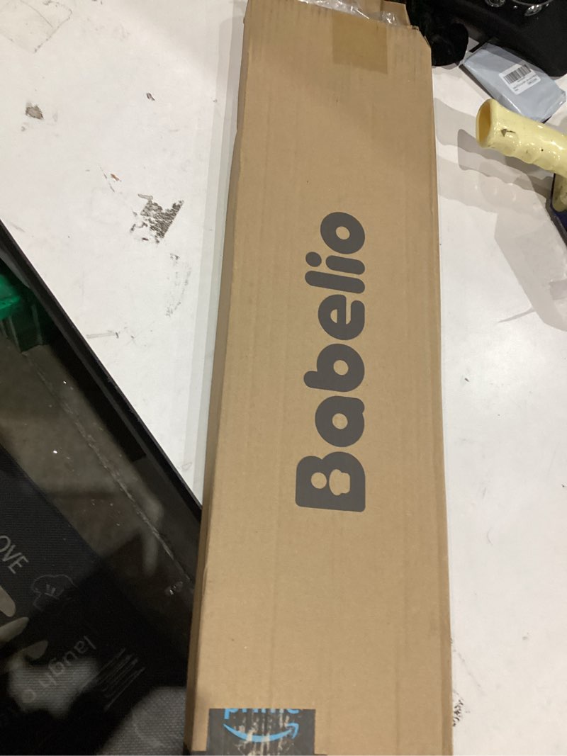 Condition photo showing As Is for BABELIO Metal Baby Gate,5.5inch (14cm) Black Extension, Extra Wide Baby Gates for Stairs & Doorways, Pressure Mounted Walk Thru Child Gate with Door, NO Need Tools NO Drilling,30" Tall 30" High, 5.5" Wide Extension Black