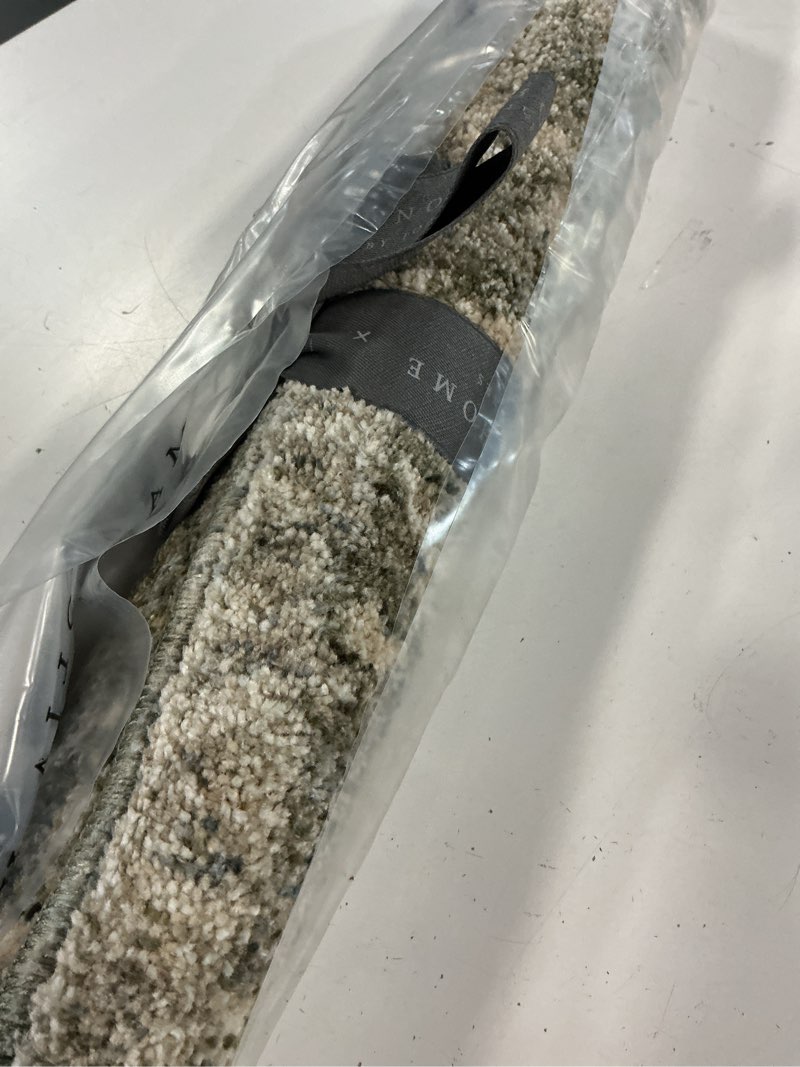 Condition photo showing As Is for loloi magnolia home by joanna gaines junie collection jue-02 moss/natural 2'-0" x 3'-0", .38" pile height, accent rug moss / natural 1' x 3' (rectangular)