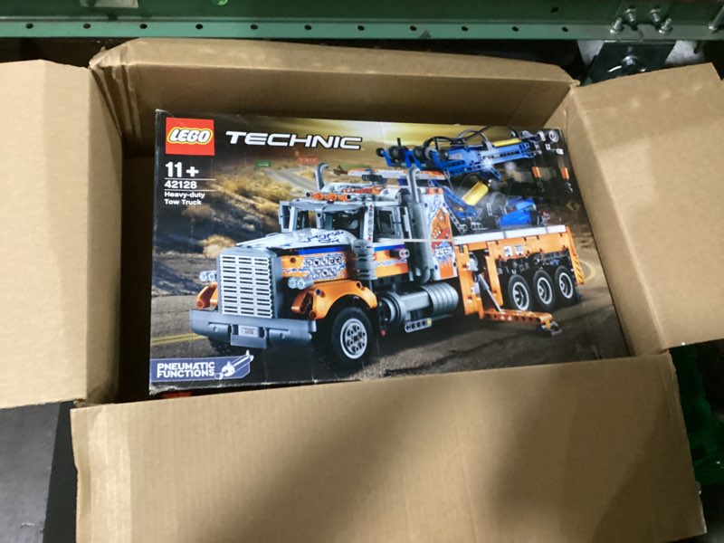 Condition photo showing As Is for lego technic heavy-duty tow truck 42128 with crane toy model building set, engineering for kids series frustration-free packaging