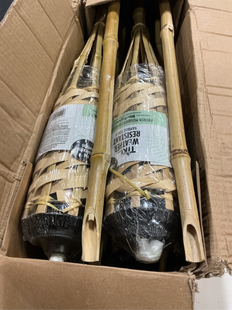 Condition photo showing New/Like New for tiki bamboo tiki torches 12-pack – weather-resistant outdoor décor with easy-pour wide-mouth canister refill for patio, garden, backyard, and parties, 57-inch citronella torches