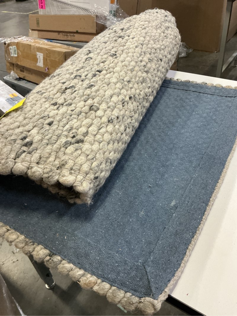 Condition photo showing As Is for nuloom glendora hand woven chevron area rug, 4' x 6', blue