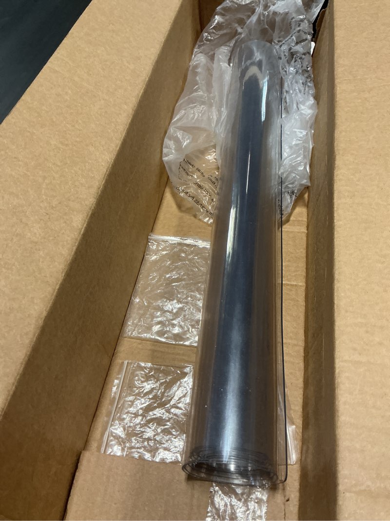 Condition photo showing As Is for 24 x 72 Inch Clear Table Cover Protector, Clear Table Protector for Dining Room Table, 1.5mm Plastic Table Cover, Waterproof Table Pad for Kitchen, Office Clear 24" x 72"