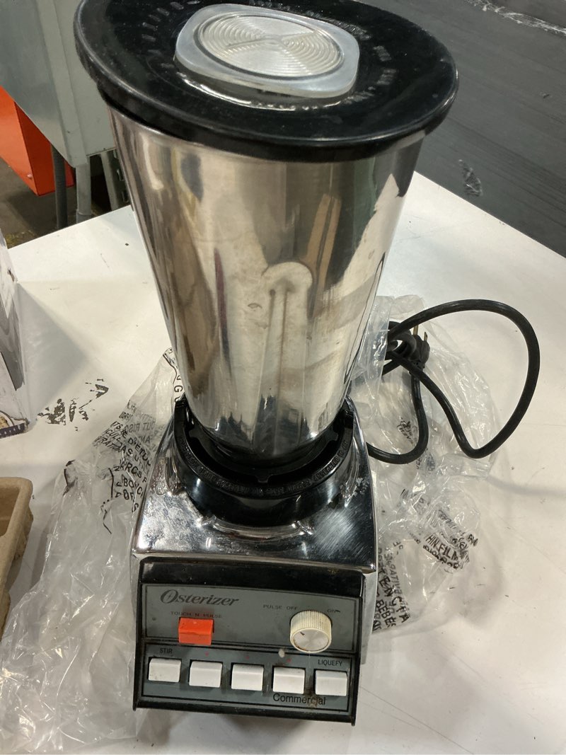 Condition photo showing As Is for VINTAGE OSTER CHROME AND STAINLESS COMMERCIAL BLENDER 352-61L