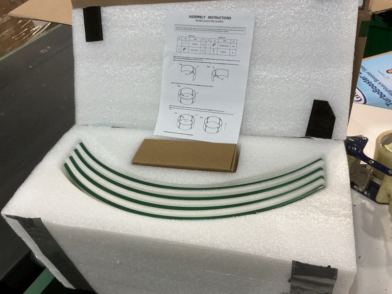 Condition photo showing Good Condition for fire pit wind guard, 17" glass wind guard for fire pit round table, made of clear tempered glass, set with assembly instructions
