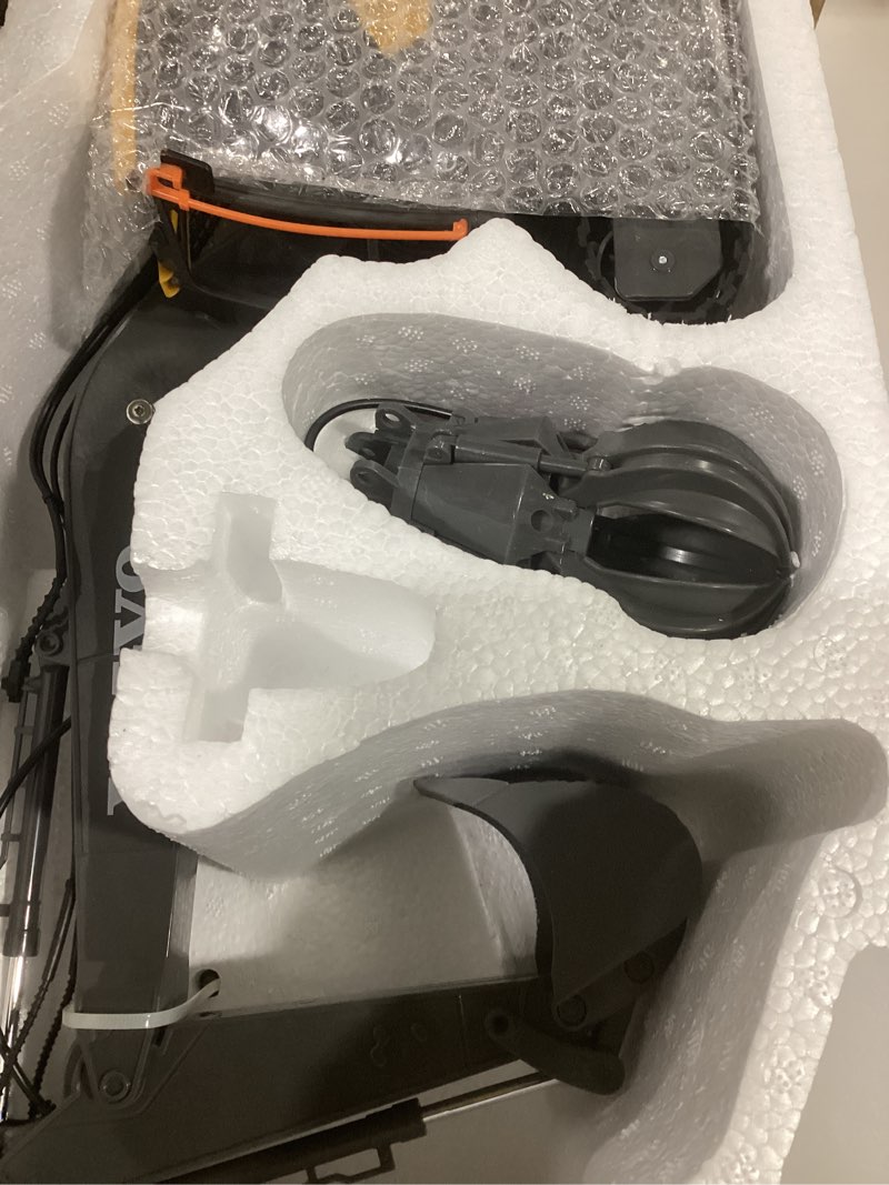 Condition photo showing Good Condition for DOUBLE E Volvo RC Excavator 17 Channel 3 in 1 Construction Toys, 17 Channel Remote Control Vehicles Tractor Sandbox Toys Digger with Metal Shovel Drill Grab RC Truck for Kids Adults