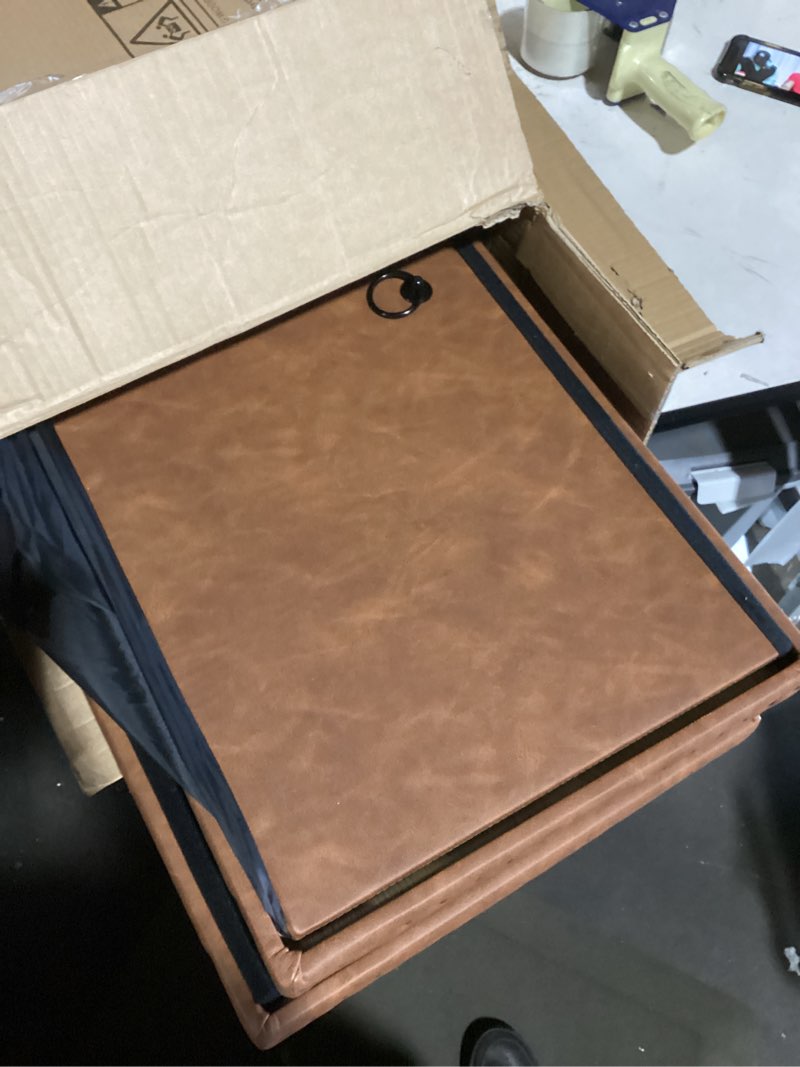 Condition photo showing As Is for 30 Inches Folding Storage Ottoman Bench, Ottoman PU Leather Tuffed End of Bed Bench, Foot Rest with Rivet Design, Ottoman with Storage, Load 330 lb, for Living Room, Bedroom, Entryway, Brown Brown 15"D x 30"W x 15"H