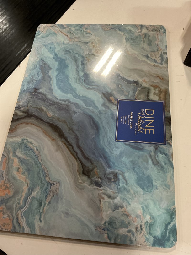 Condition photo showing New/Like New for dainty home navy marble rectangle cork placemats - heat resistant placemats, non-slip, easy clean placemats for elegant dining - 12"x18" set of 2 - perfect for stylish, modern homes navy 12" x 18" rectangle