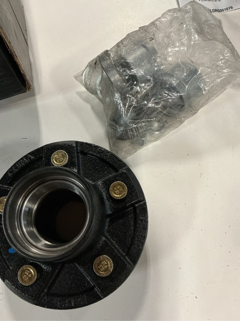 Condition photo showing New/Like New for trailer idler hub assembly 3500-lb axles - 5 on 5" bearings 5 lug #84 spindle