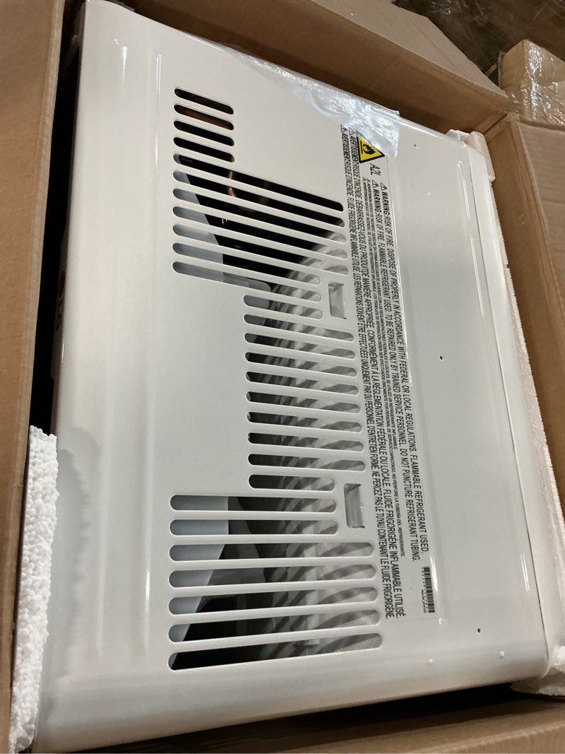 Condition photo showing As Is for 8,000 btu, 115 volts, window smart air conditioner cools 350 sq. ft. with remote, wifi enabled in white