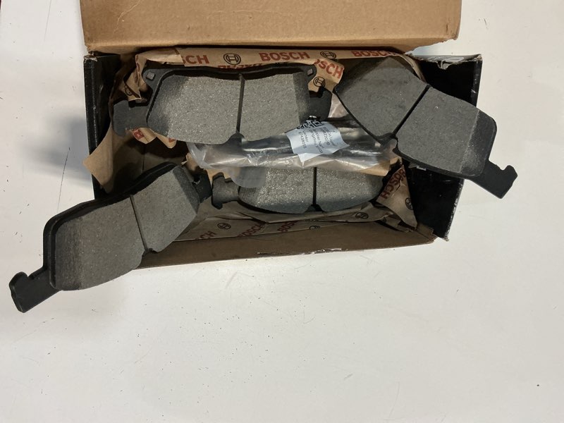 Condition photo showing As Is for bosch bc1629 quietcast premium ceramic disc brake pad set - compatible with select dodge durango; jeep grand cherokee; mercedes-benz gl350, gl450, gle350, gle400, gls450, ml350; front