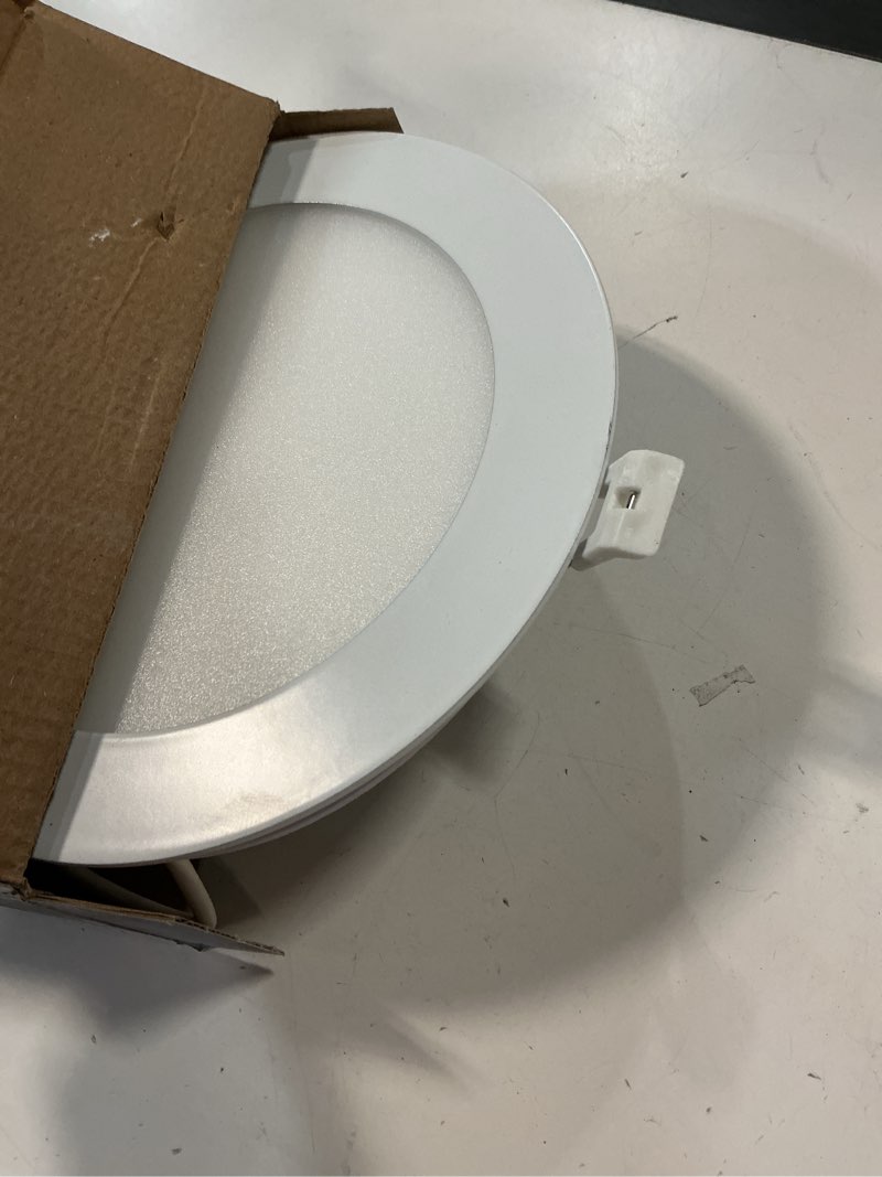 Condition photo showing As Is for utilitech white/ black 6-in 850 -lumens switchable white round dimmable led canless wet rated recessed downlight