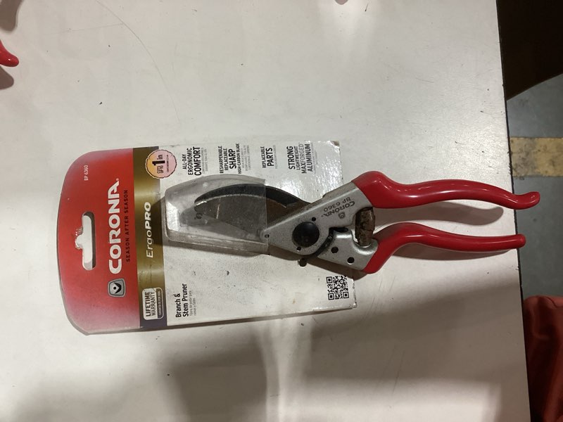 Condition photo showing As Is for 2.625 in. angled high carbon steel blade with forged aluminum handles right-handed bypass hand pruner