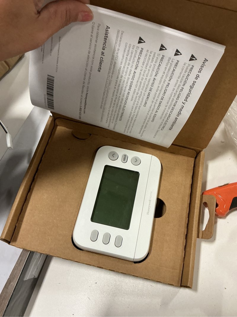 Condition photo showing As Is for New! Honeywell Home Programmable Thermostat, Single-Stage, 1 Heat/1 Cool Compatibility, 5-2 Day Schedule, X2P, White, RTH20B Single-Stage Compatible 5-2 Day Programmable