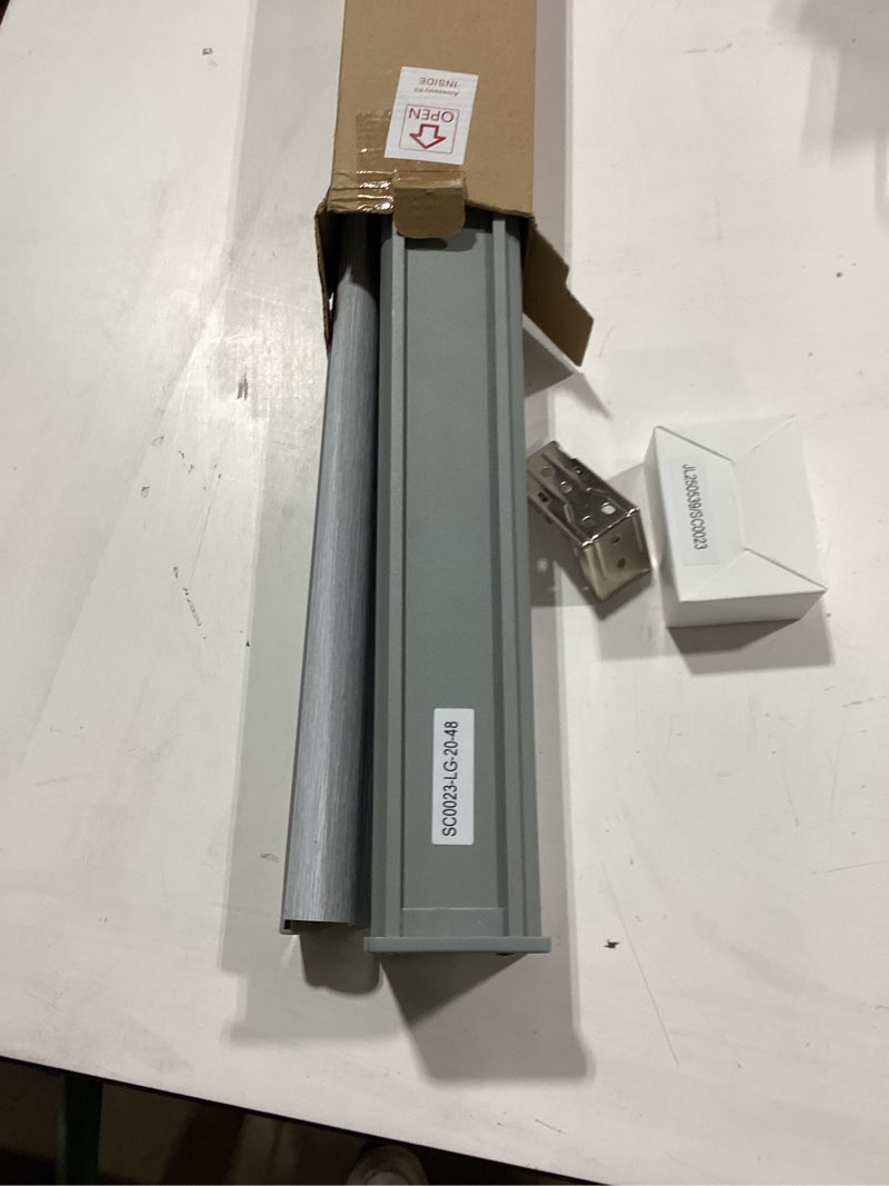 Condition photo showing Good Condition for joydeco 100% blackout roller shades cordless blinds for windows, free-stop shades, uv protection, natural woven blinds for home and office, light-proof aluminum cover (gray, 20" w x 48" h) light grey (aluminum cover) 20"w x 48"h