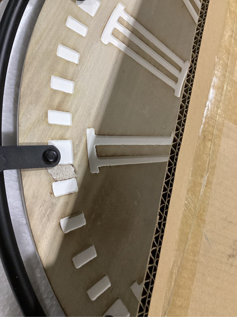 Condition photo showing New/Like New for Vantic Farmhouse 24 Inch Extra Large Decorative Wall Clock with Metal Circle, Oversized Wood Wall Clock with Large Roman Numeral for Living Room, Bedrooms and Offices, Silent and Battery Operated