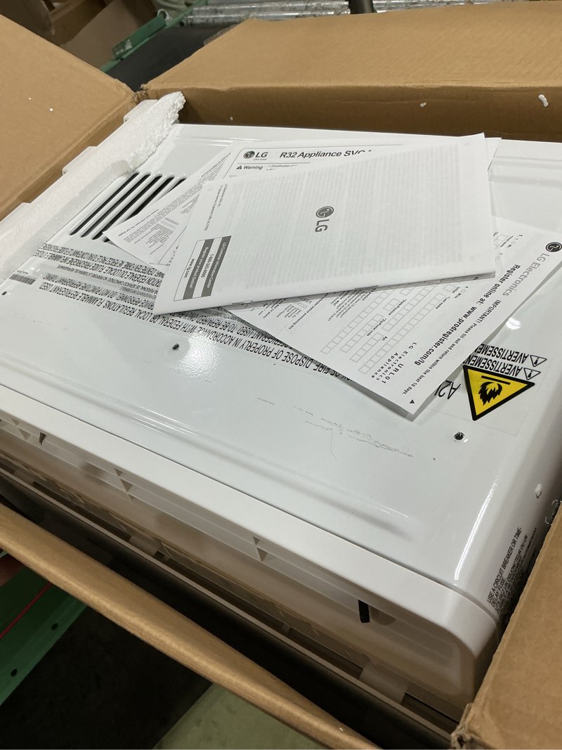 Condition photo showing As Is for lg 5000 btu window air conditioner with remote, easy mechanical control ultra-quiet compact-size cools 150 sq.ft. for small room, washable filter ac unit easy installation white lw5025r 5000 btu remote white